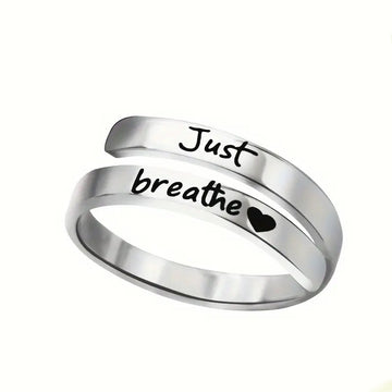 Anillo de corazón en espiral plateado
